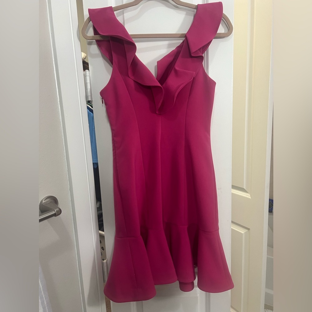 Likely dress. Super cute and flattering!